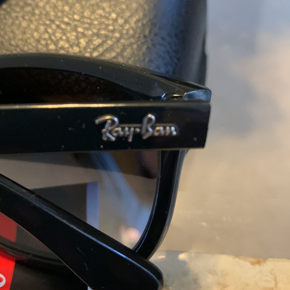 Ray Ban Sunglasses. Retail I paid 175.00 saw the same pair online 158.00. New - Picture 3 of 4